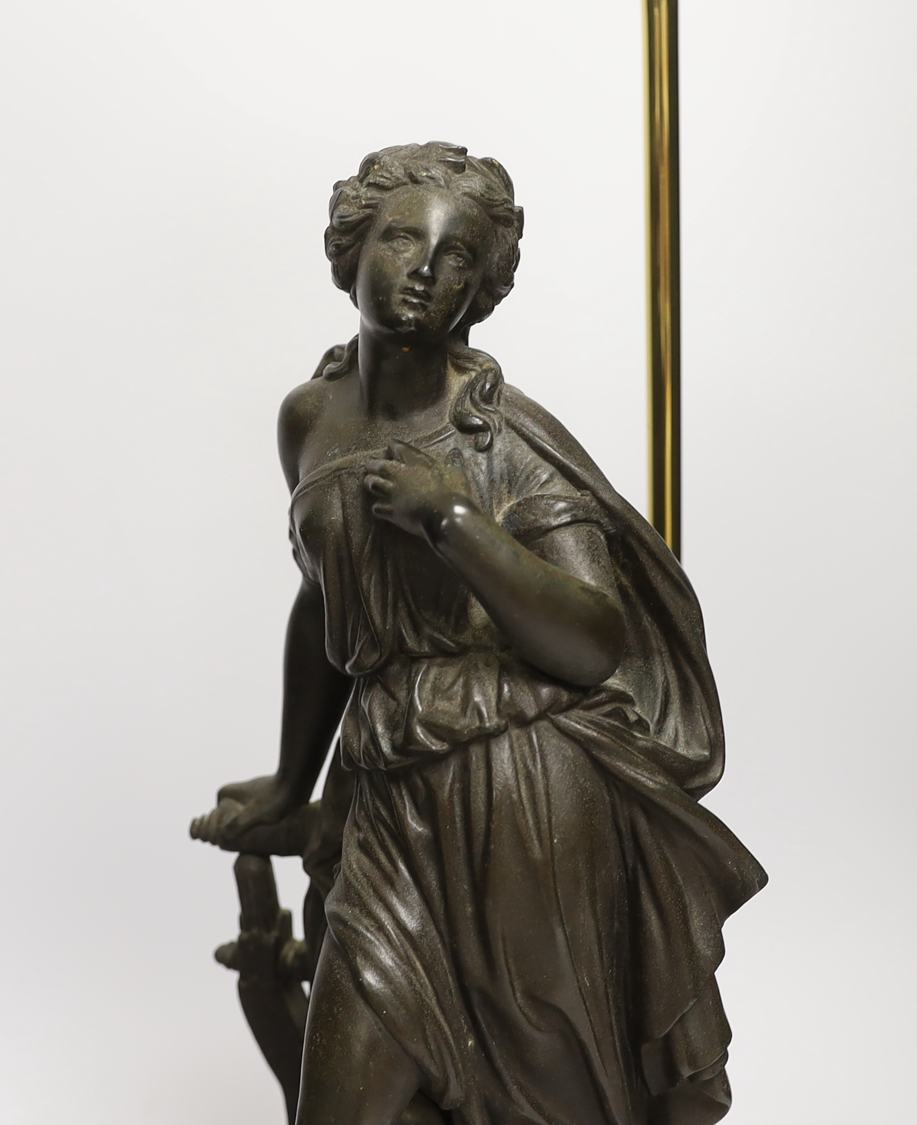 A pair of spelter figural table lamps emblematic of poetry and history, overall 56cm high
